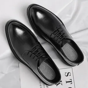 Professional black leather men's formal dress shoes with a sleek pointed toe design