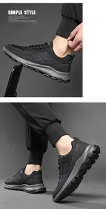 Perfil lateral de zapatos deportivos negros para hombre con suelas de goma duraderas