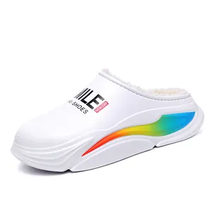 Close-up of white warm clog with fuzzy lining and rainbow side pattern