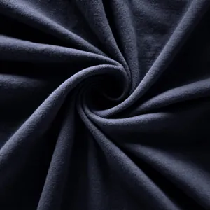 Détail macro de tissu en coton bleu marine doux en spirale pour débardeur de sport