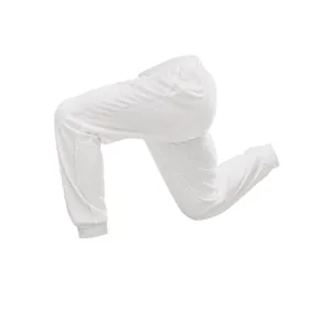 Close-up detail showing the white knitted men's sports pants with jacquard texture