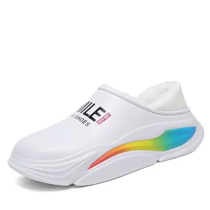 Detailed view of white waterproof outdoor shoe with warm fuzzy lining and rainbow sole