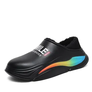 Close-up detail of black outdoor slip-on shoe with warm fur lining and rainbow sole