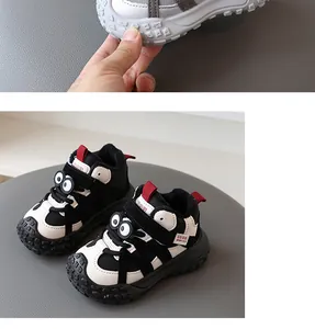 Close-up of cute cartoon children's winter sneakers with warm fleece lining.