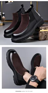 Detailansicht der schwarz-braunen Chelsea-Boots für Herren mit dicker Sohle