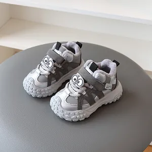 Winter children's grey sneakers featuring cute cartoon eyes and warm plush lining.