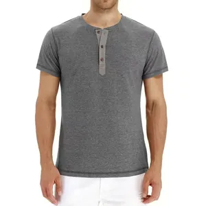 Detailed macro view of a men's slim fit grey Henley shirt with three-button neckline