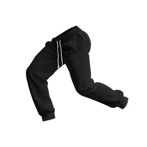 Detailed macro view of men's black cable knit sweatpants with adjustable drawstrings.