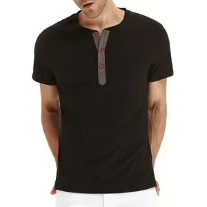 Detail view of a men's classic black Henley shirt with contrasting grey button placket.