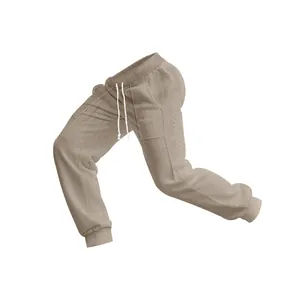 Detailed visual of men's beige cable knit joggers featuring an adjustable drawstring waist