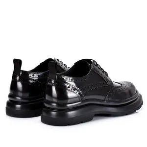 Klassische schwarze Brogue-Lederschuhe für Herren mit dicker Sohle und Flügelspitze