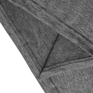 Macro detail of grey quick-dry fabric on a men's retro round neck Henley T-shirt