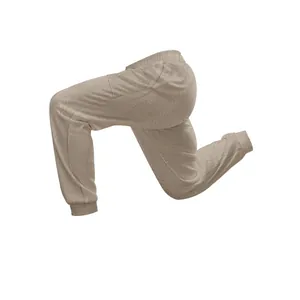 Detailed side view of beige knitted men's jogger pants showing fabric texture and fit