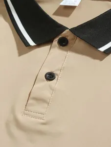 Macro view of khaki polo shirt collar featuring black striped trim and black buttons
