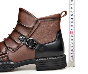 Close-up of vintage leather Chelsea boot showing spliced texture and height measurement