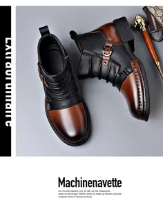 Close-up of vintage men's patchwork leather Chelsea boots with side zipper detail.