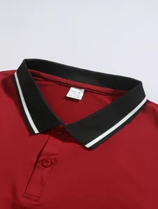 Detail view of red Polo shirt featuring a striped black jacquard collar and buttons