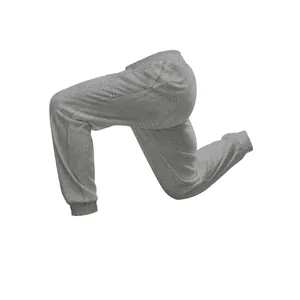 Close-up of grey textured knit joggers featuring elastic waist and ribbed leg cuffs.