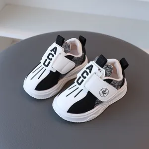 Scarpe sportive per bambini traspiranti in bianco e nero con suola morbida e confortevole