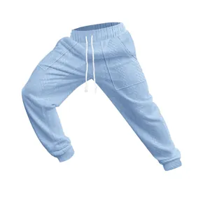 Detailed view of light blue knitted drawstring joggers with cable pattern texture.