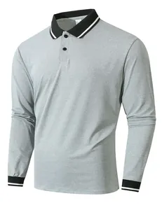 Detailed view of grey long-sleeve polo shirt with black contrast collar and cuffs.