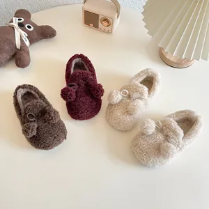 Cozy children's fleece-lined pom-pom slip-on shoes in multiple warm colors for winter