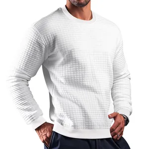 Close-up of white slim fit men's long sleeve shirt with waffle knit texture.