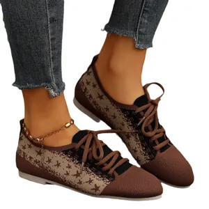 Brown fly-woven women's flat shoes with lace-up design and star patterns