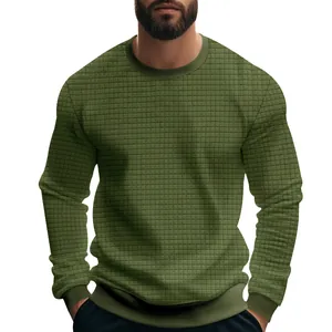 Close-up detail of the olive green long sleeve t-shirt featuring a micro-grid texture