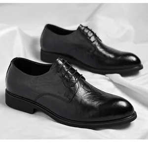 Macro view of the unique hand-crumpled texture on black vintage men's formal dress shoes.