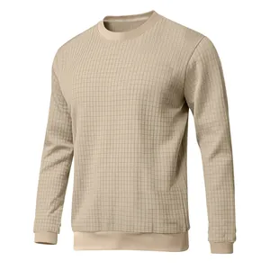 Close-up of khaki slim fit crew neck long sleeve shirt with grid texture