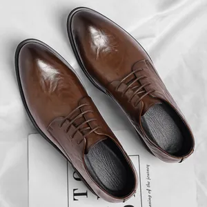 Classic brown men's dress shoes with vintage hand-grabbed texture and pointed toe style