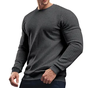 Detailed view of men's charcoal gray waffle knit long sleeve slim fit crew neck t-shirt.
