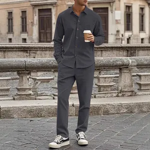 Detailed view of grey corduroy casual long sleeve shirt and pants set for men.