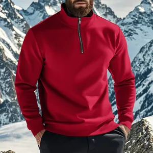 Close-up of red men's half-zip sweatshirt featuring a stand collar and fleece lining.