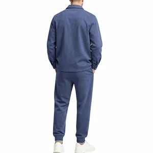 Back view of men's blue suede jacket and trousers set for casual autumn wear.