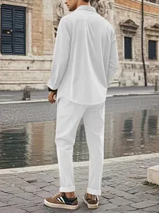 Back view detail of men's white corduroy casual long-sleeve shirt and trousers set.