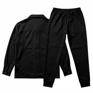 Back view of black suede jacket and matching joggers on a clean white background