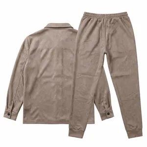 Detail view of men's taupe suede casual jacket and matching jogger pants set.