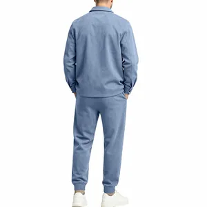 Rear view of men's blue suede casual tracksuit showing relaxed fit and fabric texture