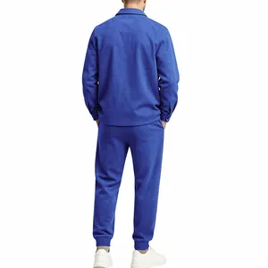 Rear view of comfortable men's royal blue faux suede tracksuit including jacket and joggers