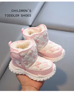 Side detail of pink quilted winter snow boots for toddlers with warm fleece lining