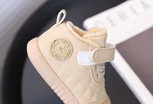 Detailed view of warm plush toddler shoes with soft non-slip sole for winter