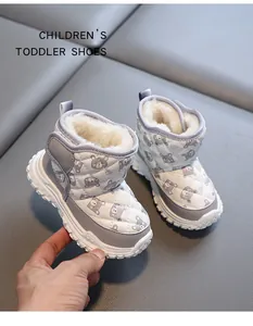 Warm children's winter snow boots with soft faux fur lining and cute bear pattern print