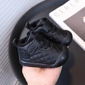 Black quilted baby winter boots with warm fleece lining and soft anti-slip soles