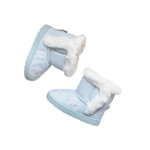 Light blue girl's winter snow boots with white faux fur and snowflake embroidery
