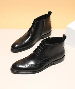 Detailed view of black leather Brogue Martin boots with wingtip carving and zipper.