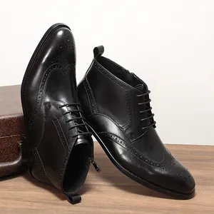 Detailed view of black leather Brogue Martin boots with intricate wingtip carving.