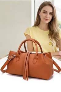 Vintage large capacity brown faux leather tote bag for women shown with model