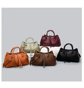 Stylish minimalist leather tote bags in five elegant colors featuring textured pebble grain.